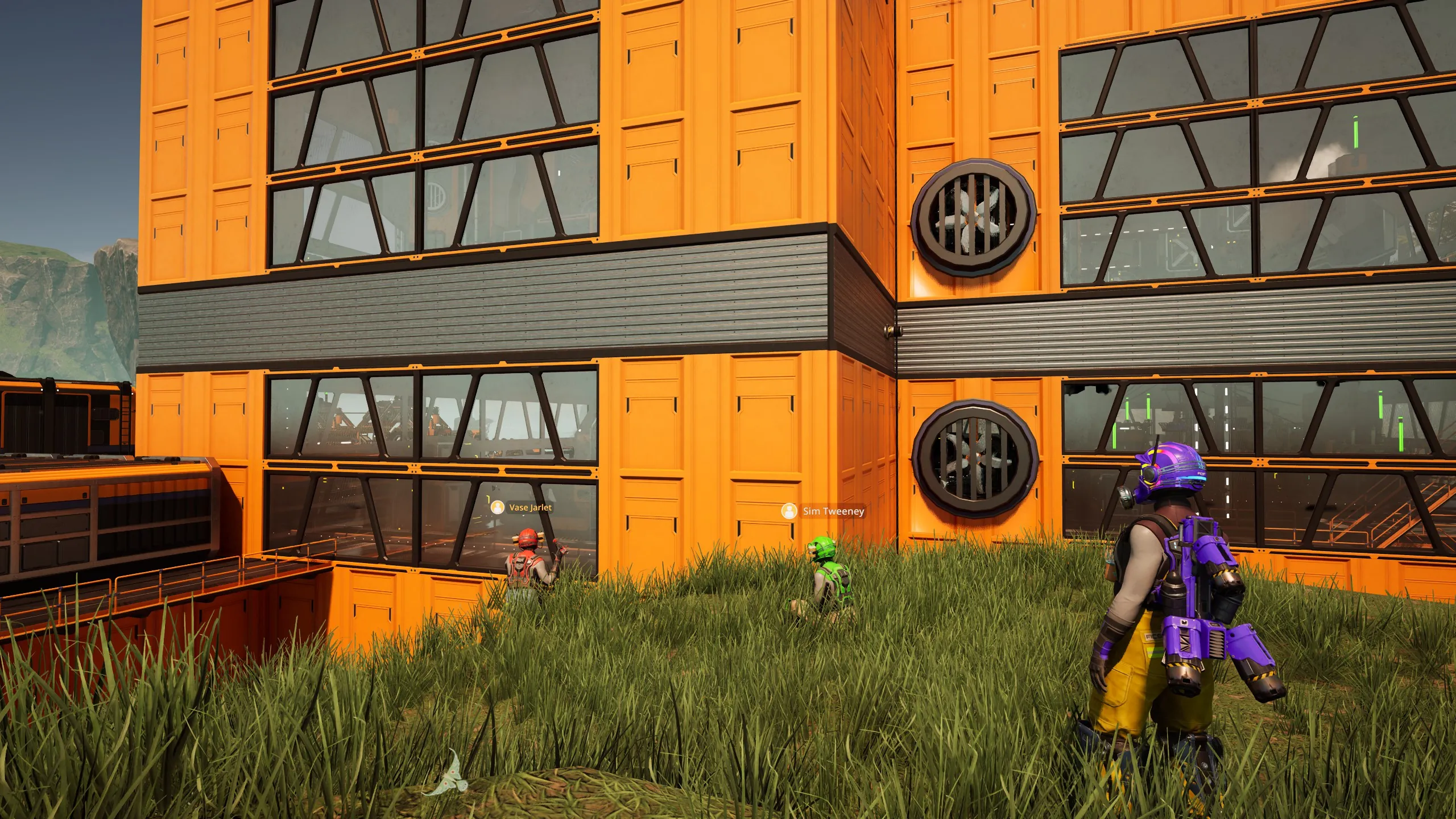 Sim Tweeney and Vase Jarlet admire their factory