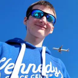 Me with a plane flying overhead